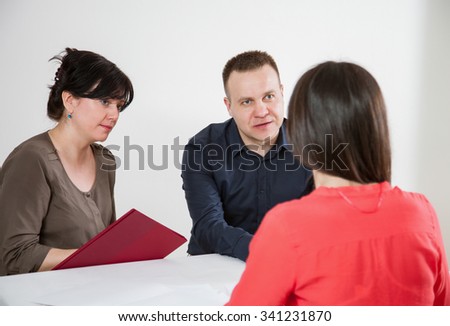 Business people communicating, neutral background