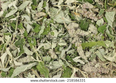 dried crushed mint leaves abstract background