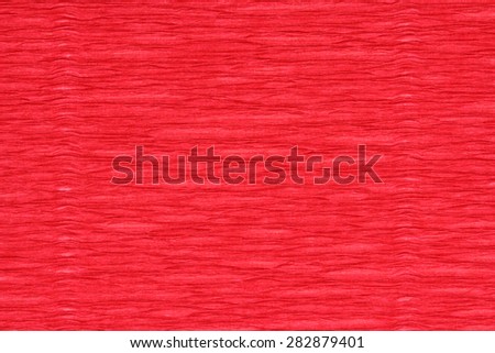 corrugated paper dyed red closeup