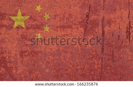National flag on rusty background: China