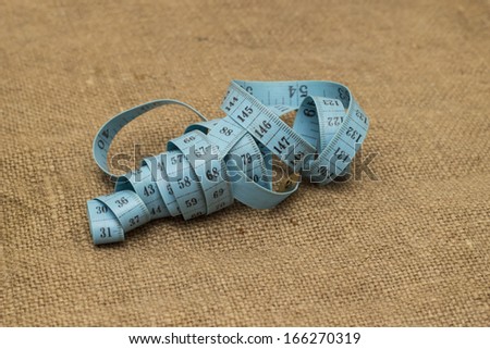 measuring tape on canvas background