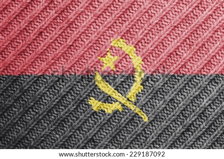 The concept of national flag on wool background: Angola