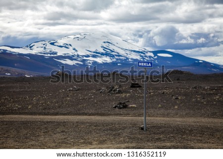 Hekla road sign with volcano in background. Hekla (Hecla) is one of Icelands most active volcanoes and a popular tourist attraction in Southwestern Iceland, Scandinavia