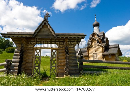 Open gate at russian wooden church