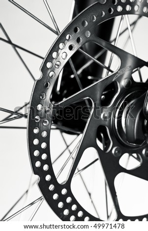 Disc brake rotor on a mountain bike front wheel