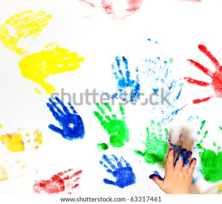 White paper with child handprints