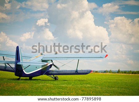Single Engine Aircraft on Vintage Single Engine Biplane Aircraft Ready To Take Off Stock Photo