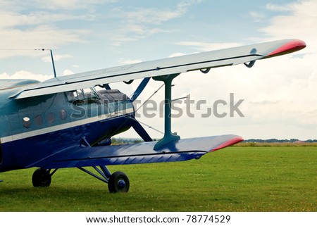 Vintage single-engine biplane aircraft ready to take off