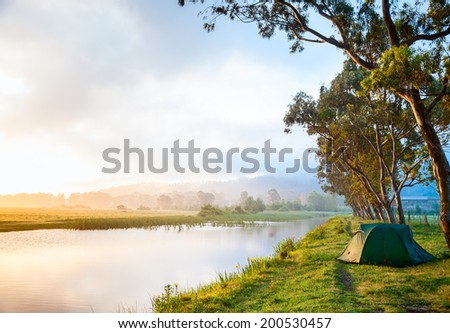 Riverside campsite in a morning light