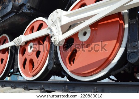 Wheel of an old steam locomotive.Crank mechanism on the wheels of the locomotive