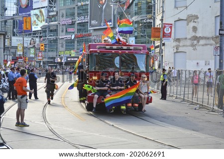 Canada, June 29: World Pride Parade 2014, Toronto, Ontario.  Estimated 12,000 people, LGBT and LGBTTIQQ2SA took part in the march, Parade to support gay and lesbian rights.