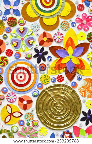colorful paper flowers, zentangle like decorative circular floral elements, made of paper