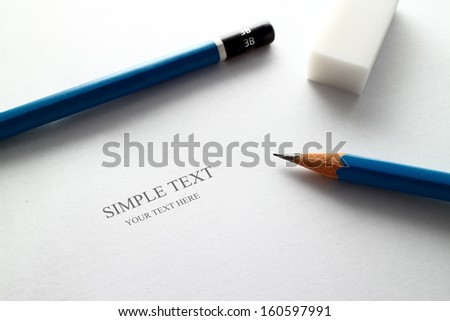 Pencil and paper your can write a text on a paper