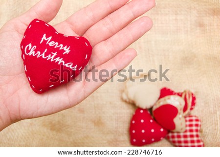 Christmas heart in hand