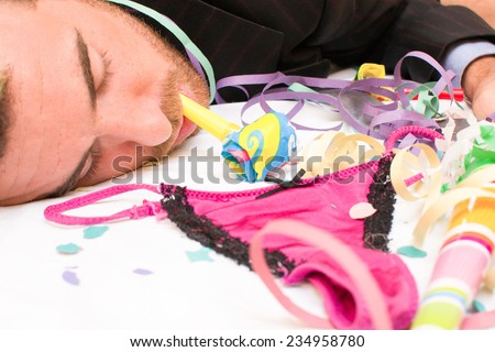 Young man sleeping after a party