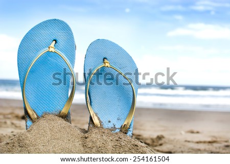 Summer shoes on sand