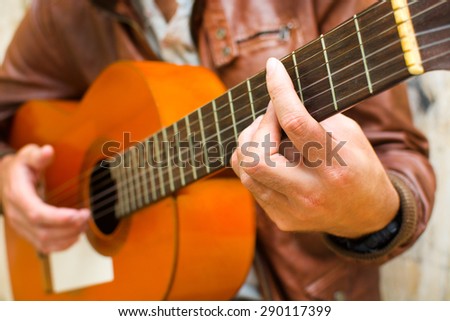 man with guitar. urban style