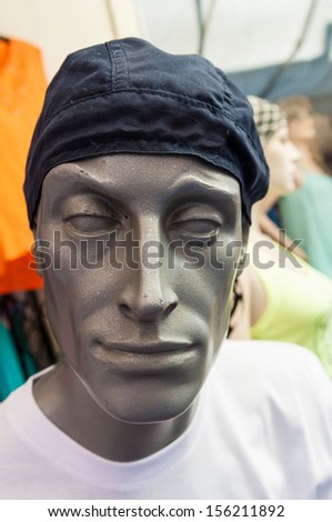 Mannequin head with blue cap