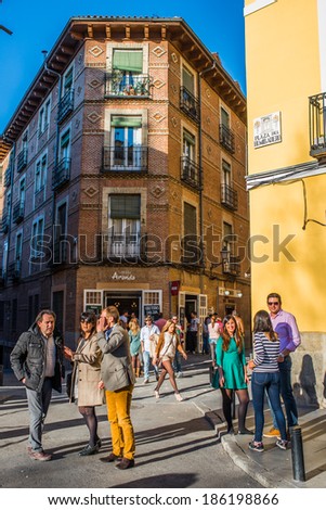 MADRID, SPAIN - MARCH 12: Old street near La Latina metro station with few cafe in March 12, 2014 in Madrid, Spain. It is old centre of capital city
