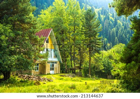 Small house in the forest in Caucasus mountains, Georgia.
