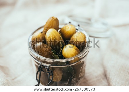 Pickled cucumbers in a small jar