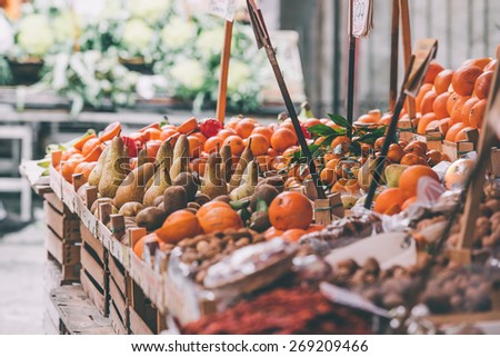 Fresh fruits and vegetables for sale in Ballaro, famous market in Palermo, Sicily island, Italy. Toned image