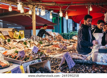 PALERMO, ITALY - MARCH 13, 2015: Seafood and fish shop at famous local market Ballaro in Palermo, Italy