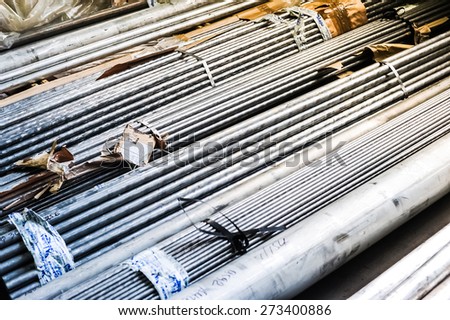 MOSCOW, RUSSIA - CIRCA MAY, 2011: Stacked aluminum rods in russian smelting plant Alfa-Metal, based in Moscow, Russia