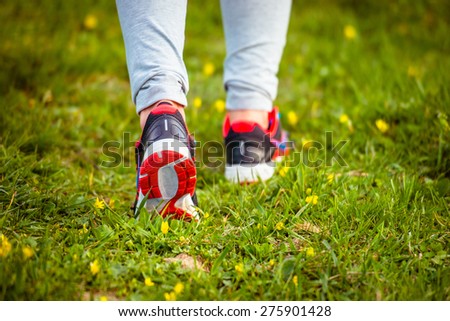 Walking or running legs on trail, adventure and exercising concept