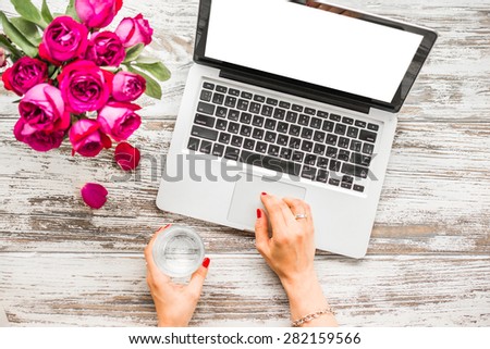 View of business woman hands busy using laptop at old wooden table. Top view