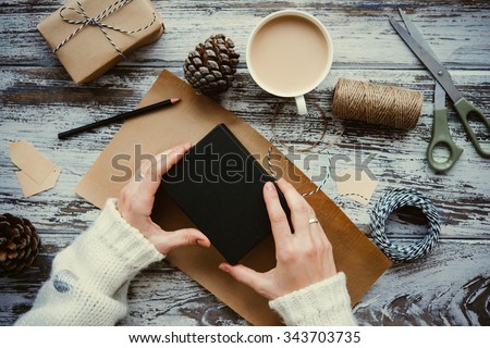 Christmas or New year gift packing. Holiday decor concept. Toned picture