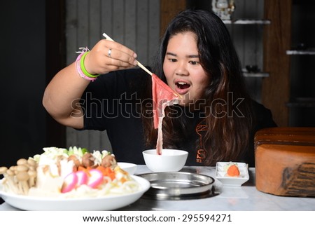 Young eating pork