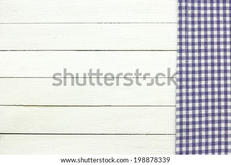 Blue Checkered Tablecloth On The White Wooden Background./ Blue Checkered Tablecloth On The White Wooden Background.