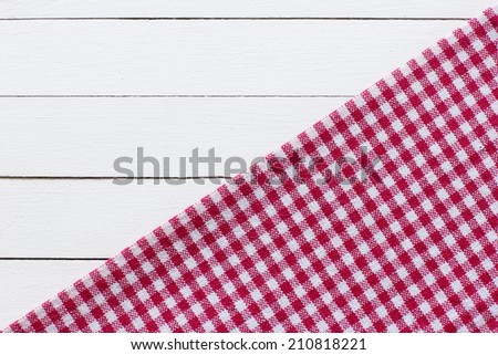 Checkered Tablecloth On The White Wooden Background./ Checkered Tablecloth On The White Wooden Background.