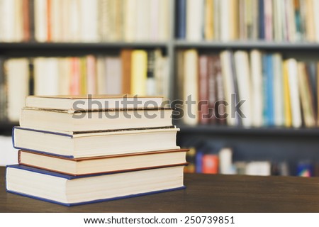 Books On Wooden Shelf./ Books On Wooden Shelf.