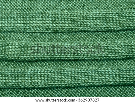 green ribbed knit wool like texture, textured fabrics knitted jersey, wool as a background pattern, upholstery