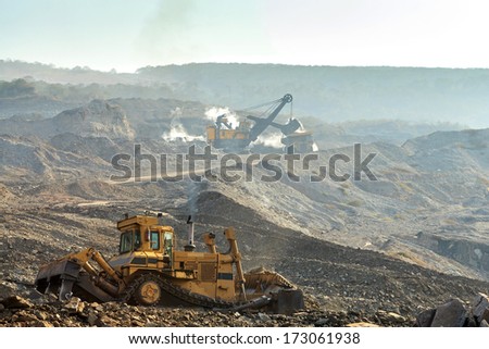 Truck and Electric Shovel in Open Pit North of THAILAND