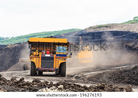 Truck and Electric Shovel in Open Pit North of THAILAND
