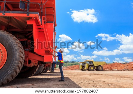 Man Big Truck Driver in Open Pit