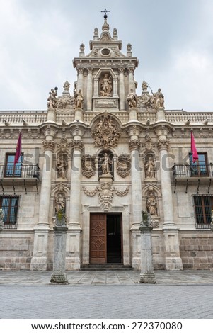 Baroque facade (1715) of the university building in Valladolid, Spain, designed by the Carmelite Fray Pedro de la Visitacion, with the emblem of the University sculpted above the main door.