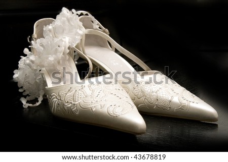White Woman High Heel Shoes on black background