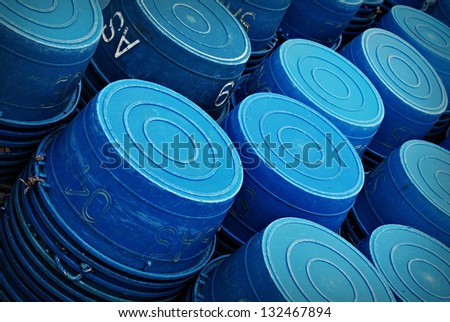 Stacked plastic containers used as temporary fishing storage