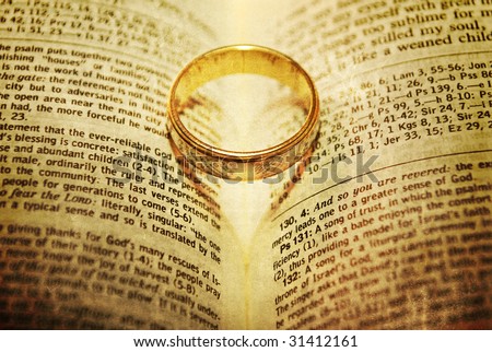 stock photo Stylized Wedding Ring on a Bible