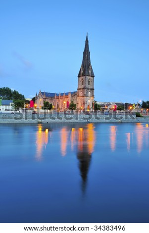 St.Muredach\'s Cathedral,Ballina,Co.Mayo, Ireland reflected in water of River Moy at twilight