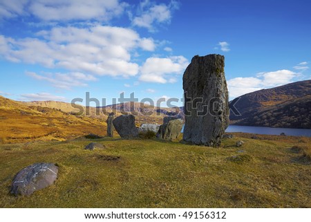 ancient stone circle in mountains overlooking Inchiquin Lake in Co.Kerry, Republic Of Ireland