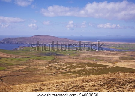 view of landscape and ocean while driving near Ballinskelligs, Co.Kerry, Ireland
