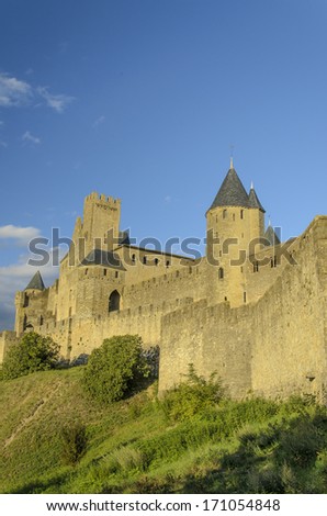 The CitÃ?Â?Ã?Â© de Carcassonne is a medieval citadel located in the French city of Carcassonne, in the department of Aude, Languedoc-Roussillon region.