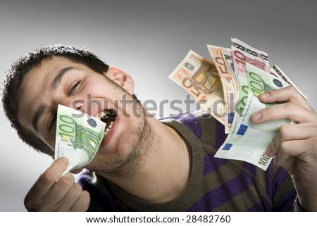 Happy businessman with bundle of euro money, good business!