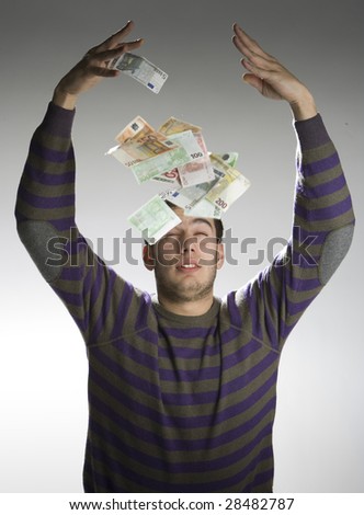 Happy businessman with bundle of euro money, good business!