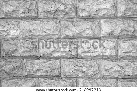 The wall of the large rectangular stones monochrome toned  as a background